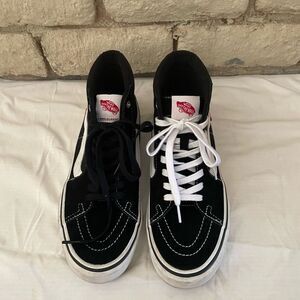Vans Black and White High-Top Sneakers